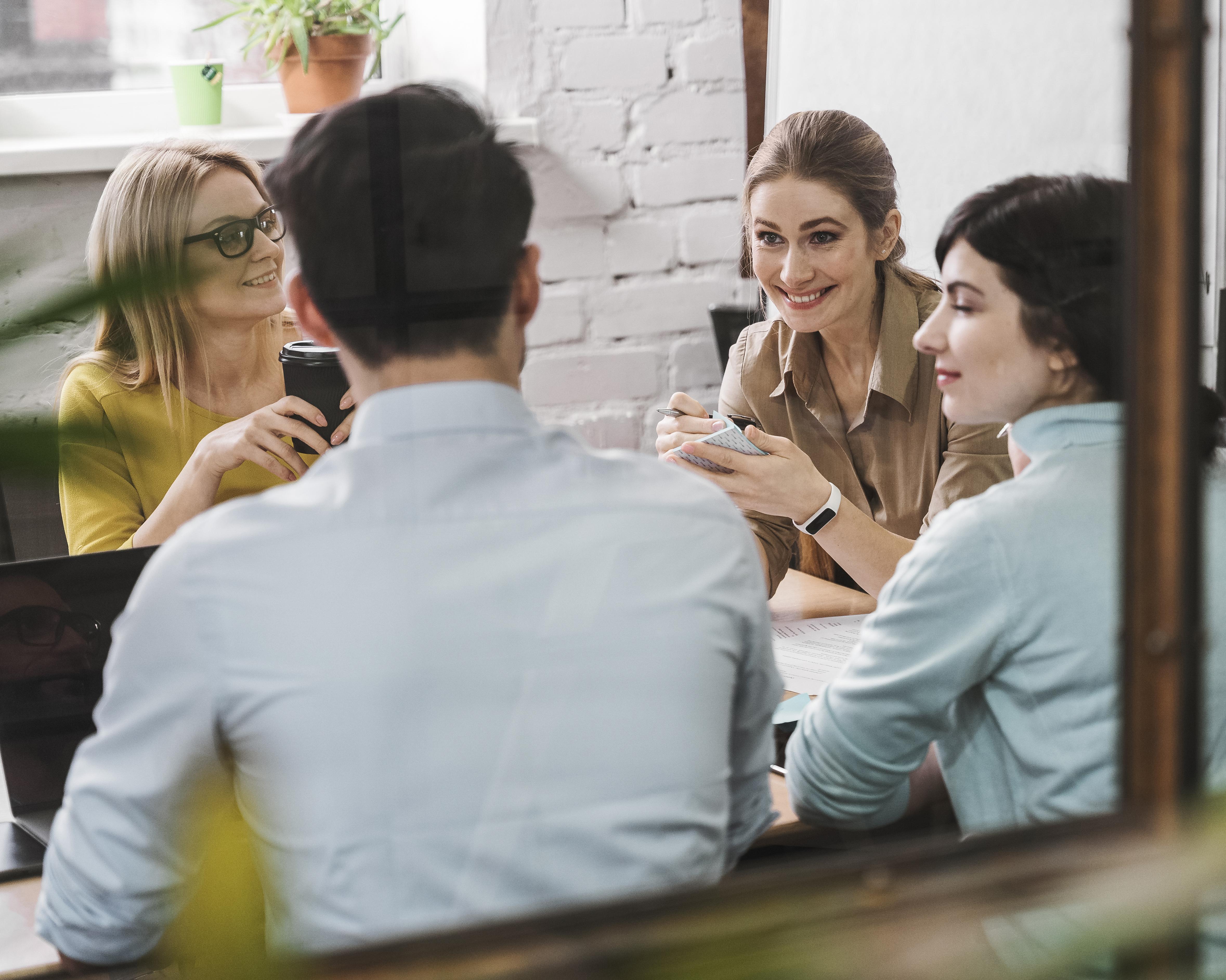Team discussing charts